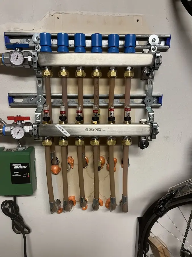 Plumber performing Water Heater Repair at a residential property in Indian Head